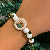 Sacred Elephant & Emerald-Beaded Pearl Rakhi Bracelet – Devotional Guru Commemorative Wristband