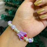 Spiritual Elegance: Lavender Marbled Bead & Pearl Rakhi Bracelet with Divine Guruji Centerpiece