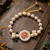 Sacred Radiance: Gold-Tone Pearl & Devotional Charm Bracelet