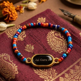 "Jai Guru Ji" Engraved Oval Charm Beaded Bracelet – Vibrant Multi-Color Devotional Bracelet