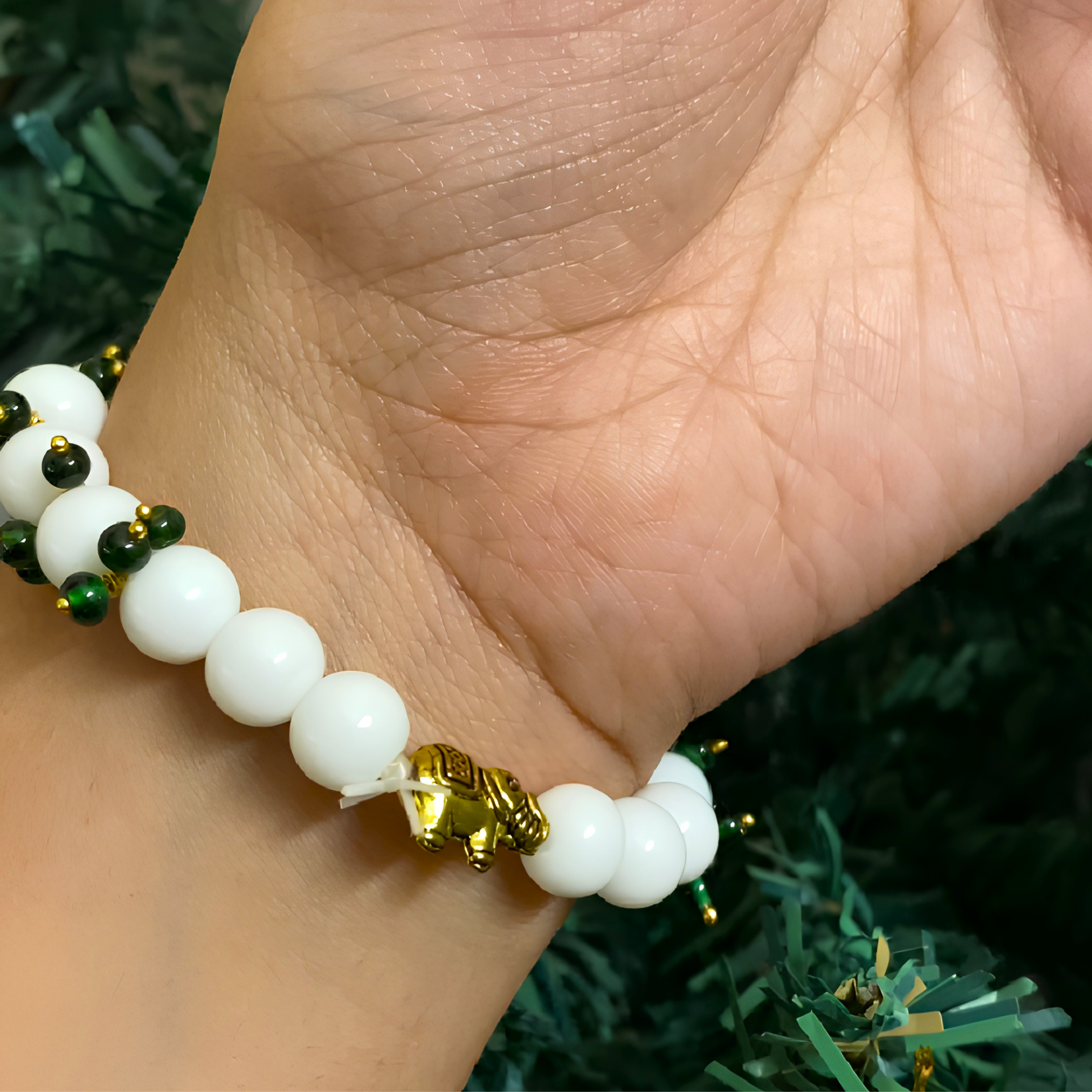 Sacred Elephant & Emerald-Beaded Pearl Rakhi Bracelet – Devotional Guru Commemorative Wristband