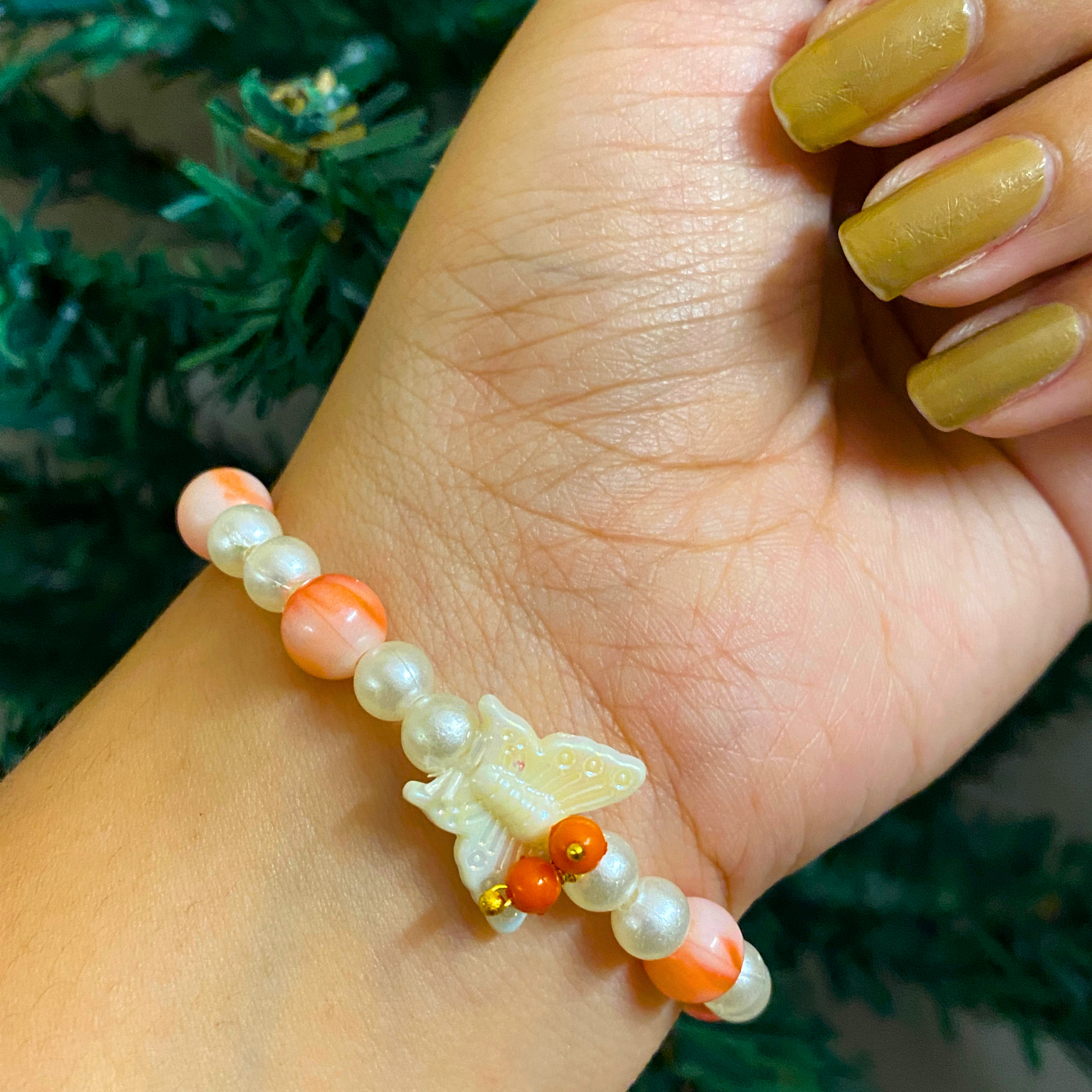 Sacred Devotion Beaded Bracelet with Spiritual Portrait Pendant & Butterfly Accent