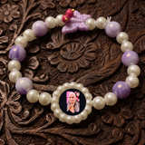 Spiritual Elegance: Lavender Marbled Bead & Pearl Rakhi Bracelet with Divine Guruji Centerpiece