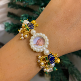 Divine Grace Pearl Rakhi Bracelet – Elegant Devotional Wristwear with Enamel Lotus Elements