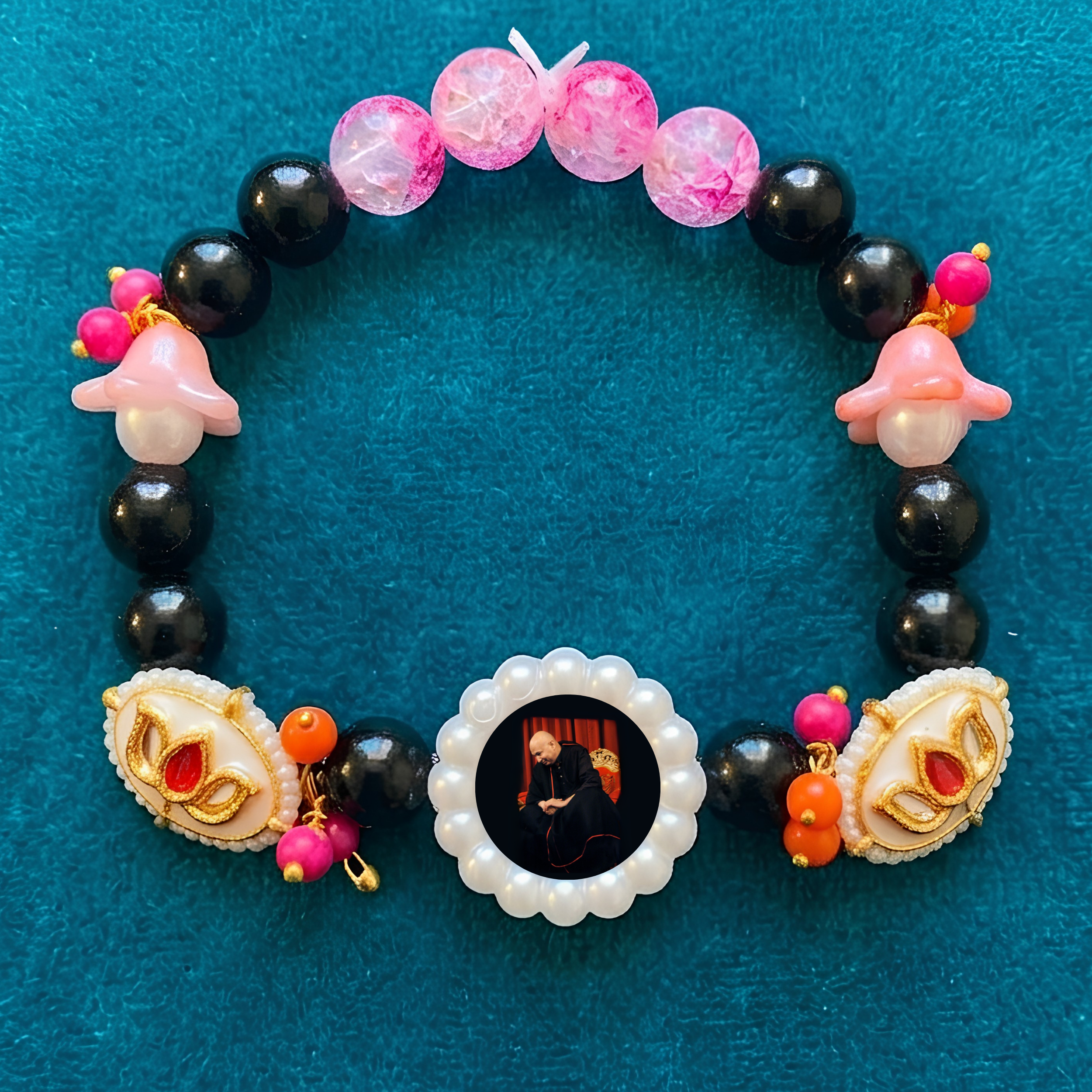 Sacred Harmony Devotional Bracelet – Handcrafted Wristwear with Black Onyx Style Beads, Crystal Pink Accents & Pearl-Framed Deity Centrepiece