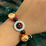 Sacred Harmony Devotional Bracelet – Handcrafted Wristwear with Black Onyx Style Beads, Crystal Pink Accents & Pearl-Framed Deity Centrepiece