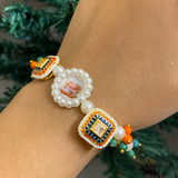 Sacred Embrace Devotional Bracelet – Handcrafted Pearl Wristwear with Meenakari Art Blessing