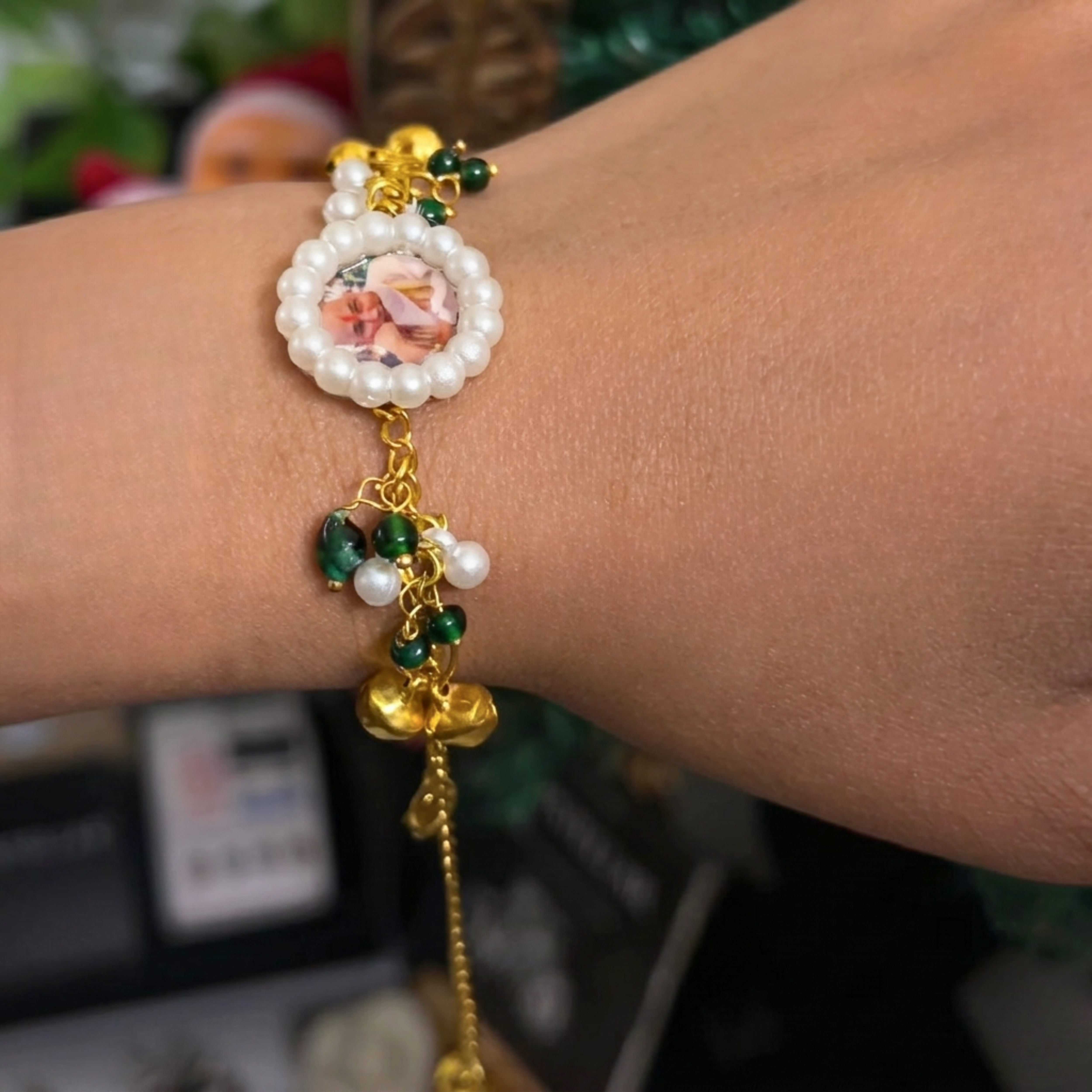 The Divine Aashirwad Bracelet: Handcrafted Guruji Swaroop Medallion with Pearls & Emerald Beads