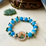 Divine Grace Handcrafted Beaded Bracelet – Celestial Blue & Pearl Elegance with Sacred Medallion