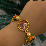 Devotional Guruji Photo Pearl Bracelet – Traditional Meenakari Peacock & Beaded Stretch Bracelet