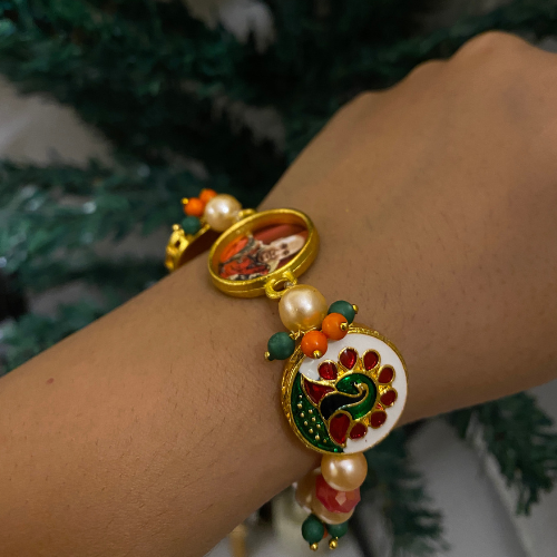Devotional Guruji Photo Pearl Bracelet – Traditional Meenakari Peacock & Beaded Stretch Bracelet