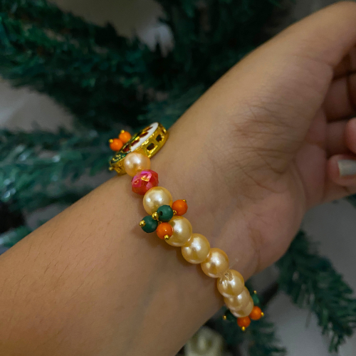 Devotional Guruji Photo Pearl Bracelet – Traditional Meenakari Peacock & Beaded Stretch Bracelet
