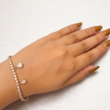 Shimmering Cascade: The Teardrop Charm Tennis Bracelet