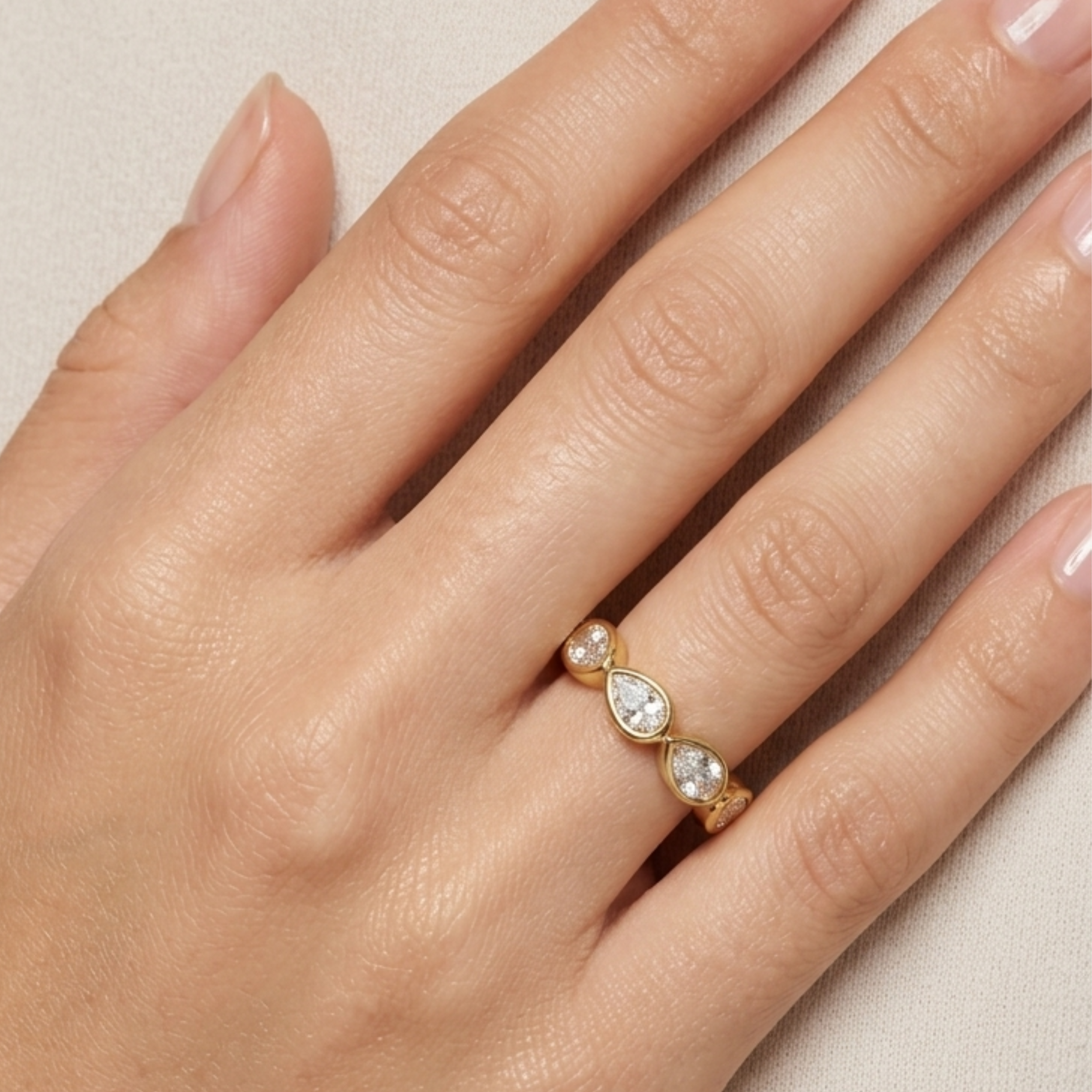 Bezel-Set Pear-Shaped Diamond Eternity Band in Yellow Gold