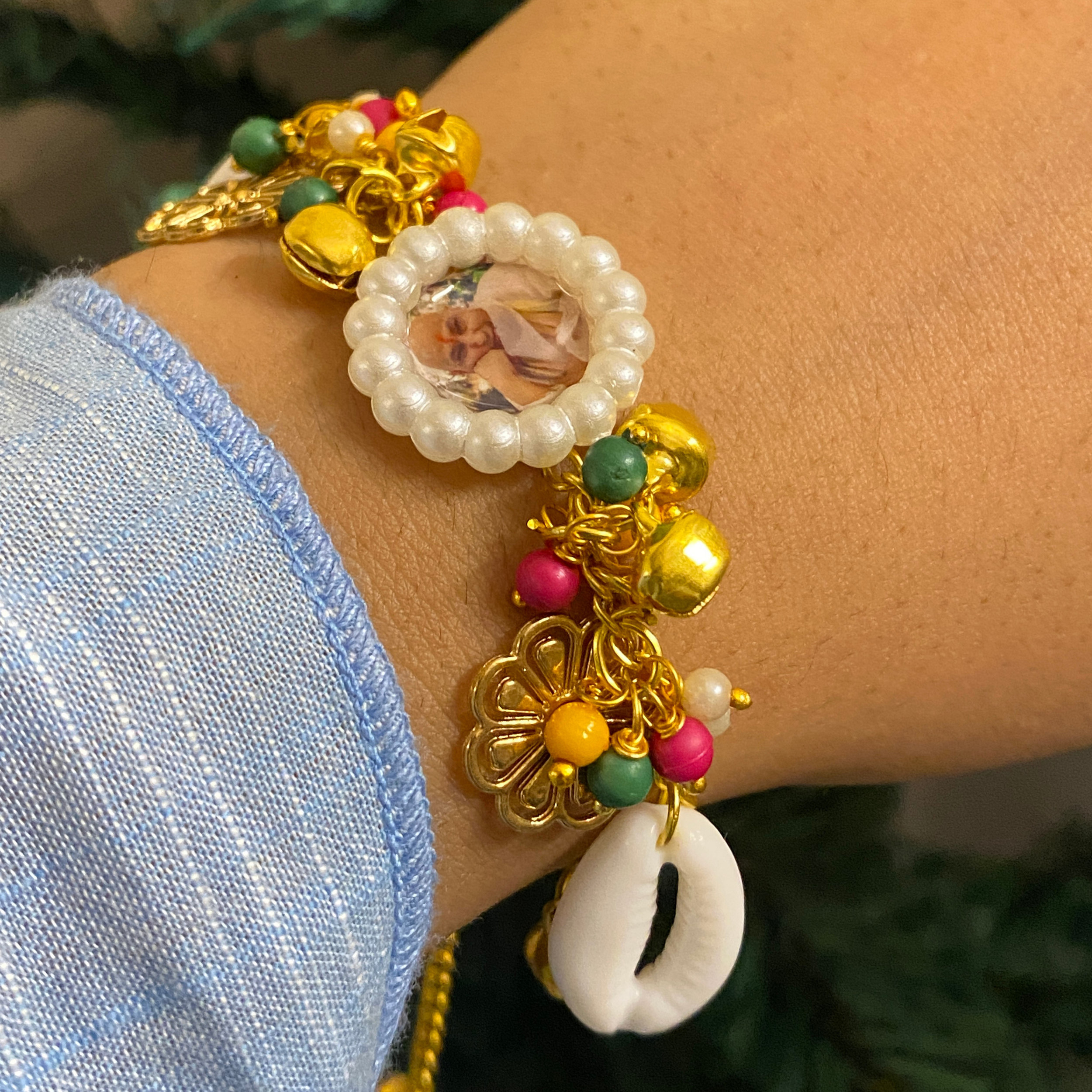 Sacred Charm Devotional Bracelet with Photo Pendant and Cowrie Shells