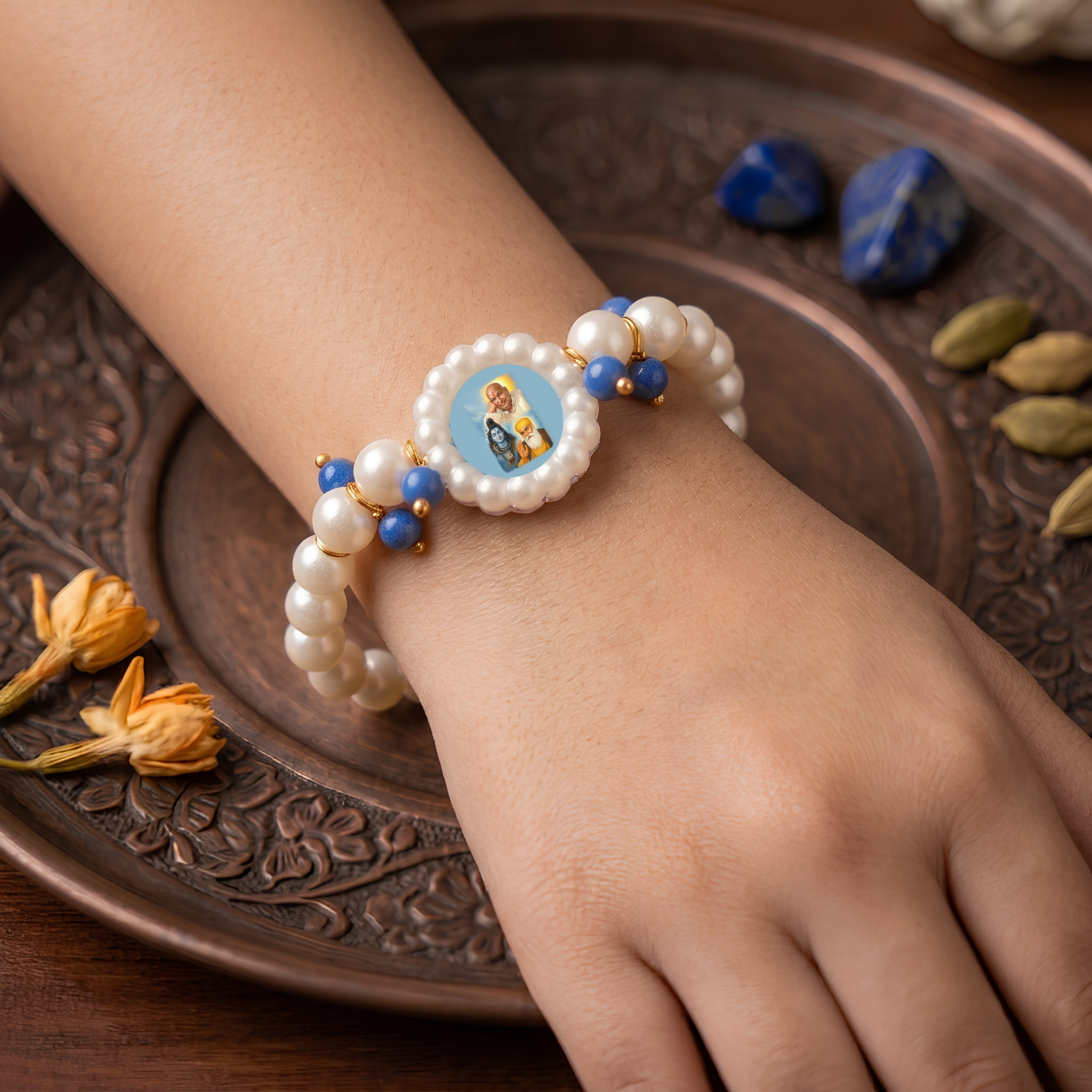 Devotional Pearl Bead Bracelet with Spiritual Centerpiece & Blue Accent Charms