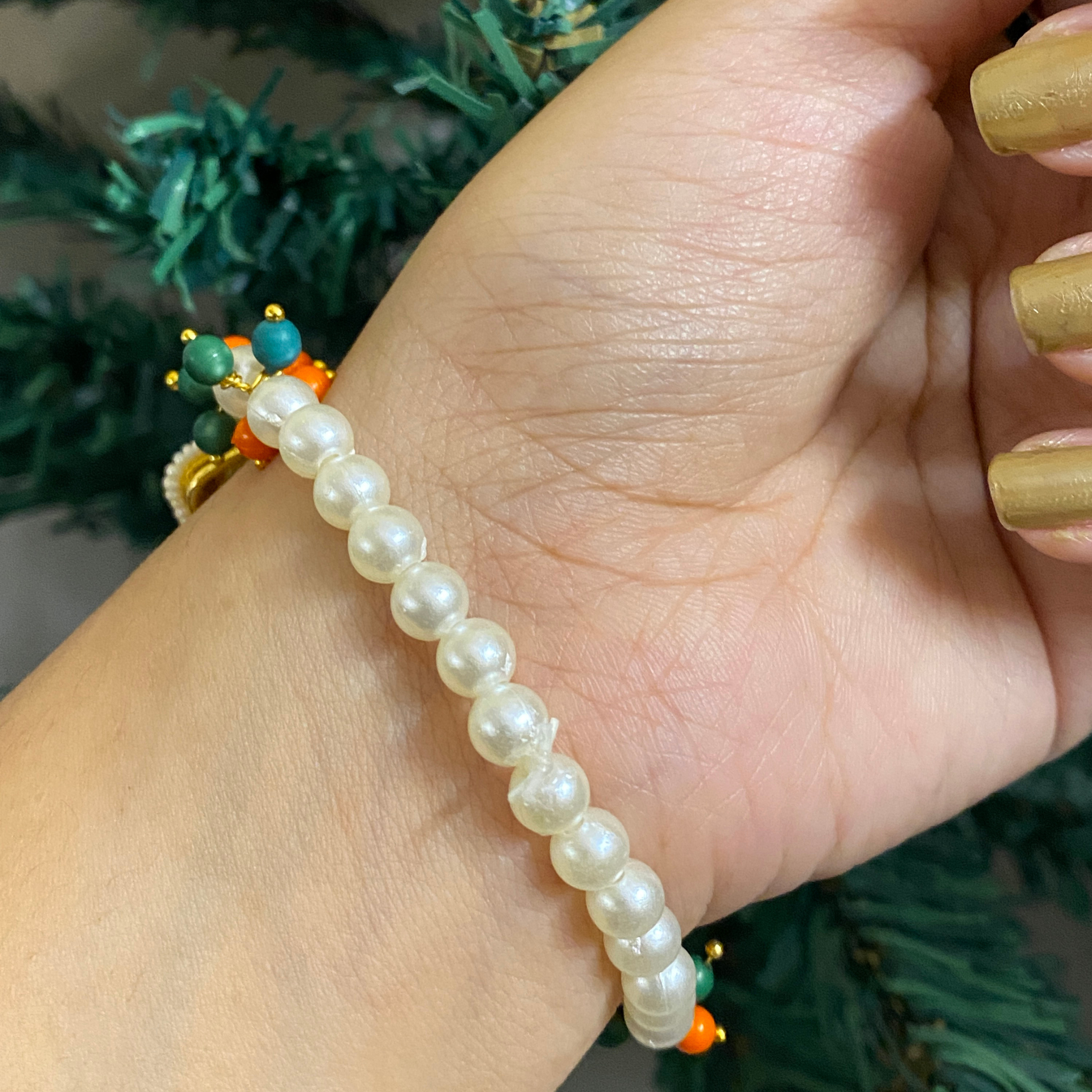Sacred Embrace Devotional Bracelet – Handcrafted Pearl Wristwear with Meenakari Art Blessing