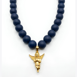 Anti-Tarnish Sculpted Cherub Angel Gold Pendant & Matte Navy Bead Necklace