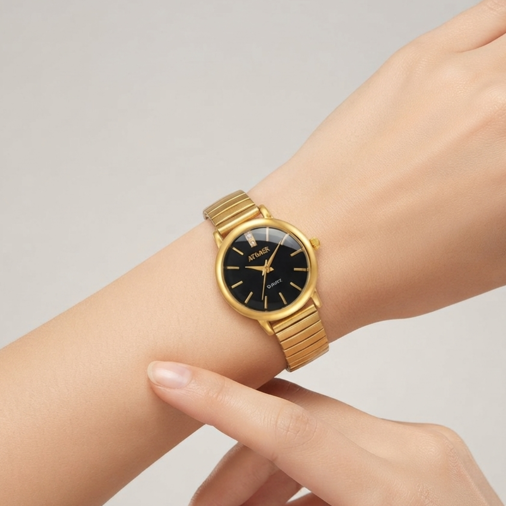 Sophisticated Minimalism: The Petite Gold & Black Dial Watch